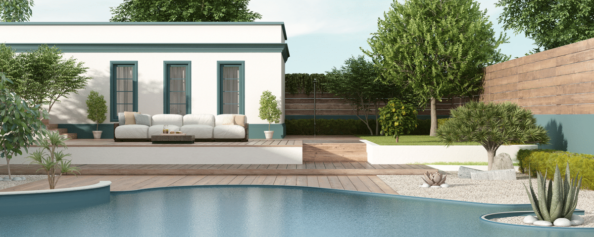 A modern home featuring a swimming pool and a spacious patio area, surrounded by greenery and outdoor furniture.